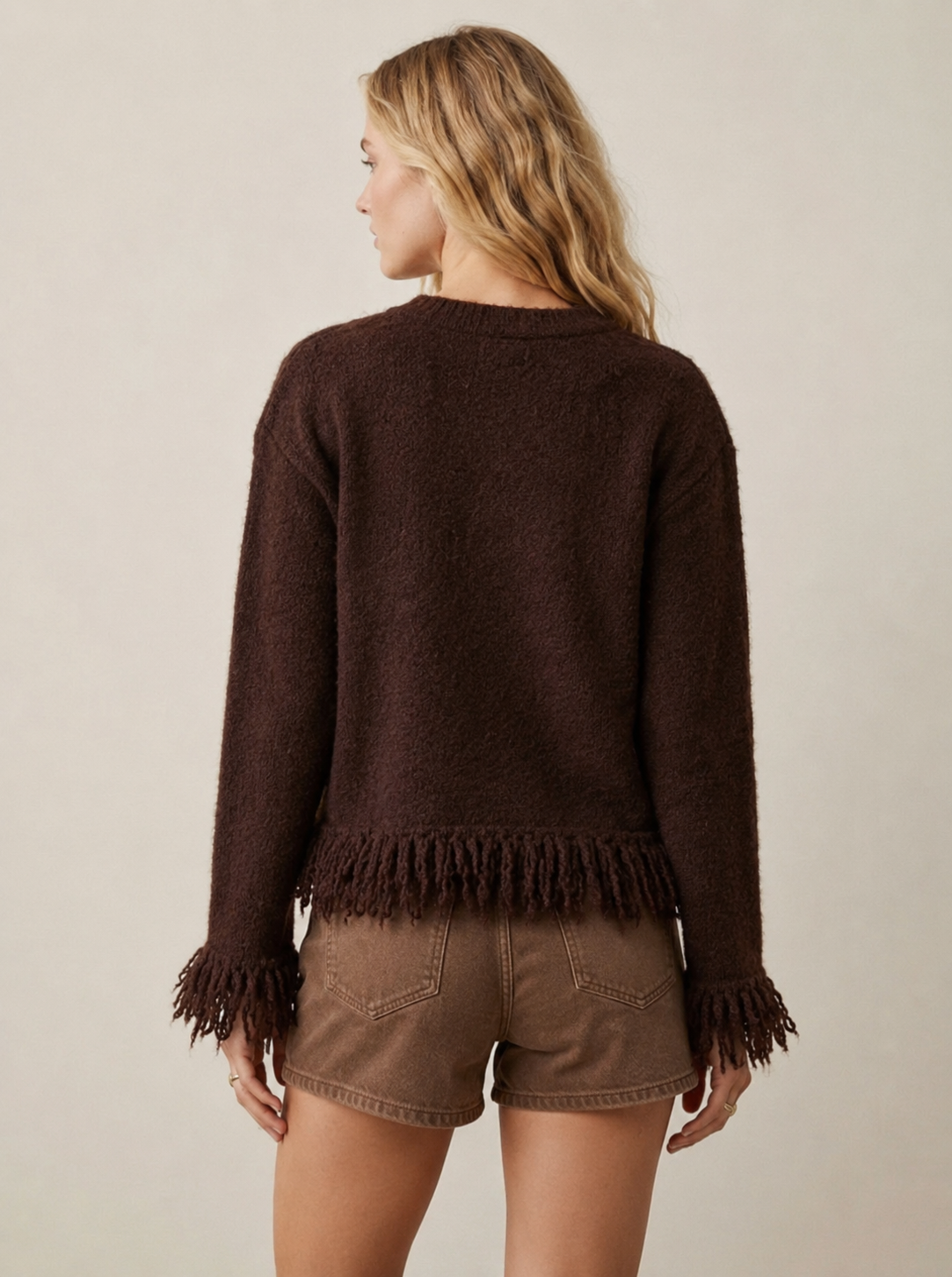 Gebreid vest met franjes