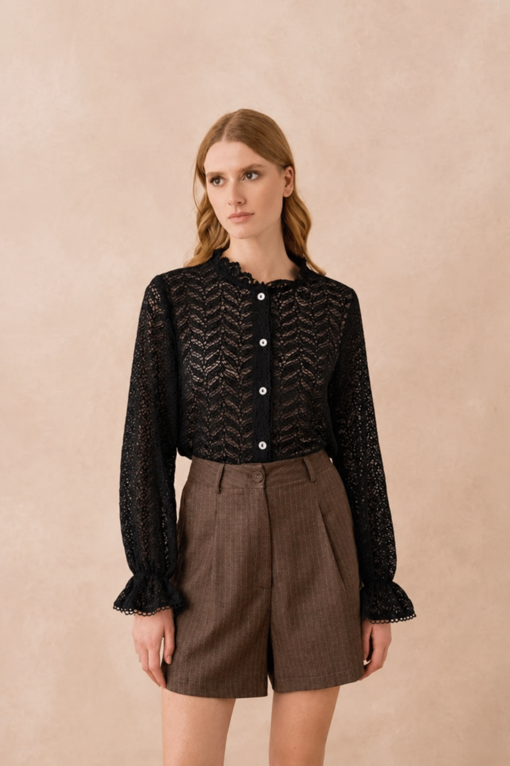 Blouse van kant met ruches