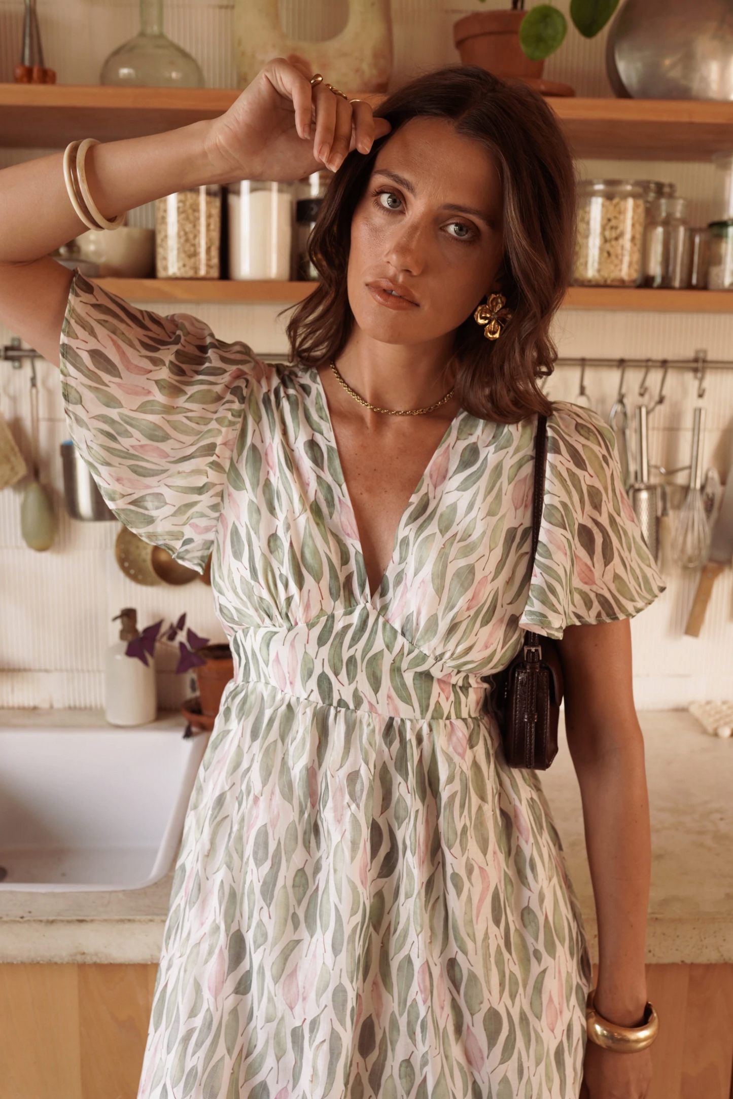 Korte jurk met pastelkleurige print.