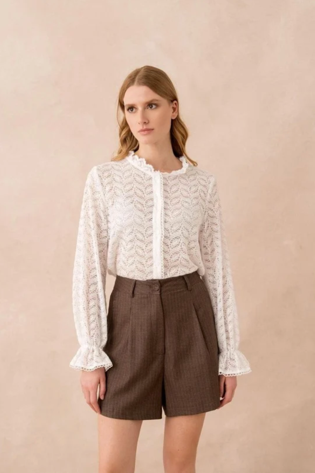 Blouse van kant met ruches