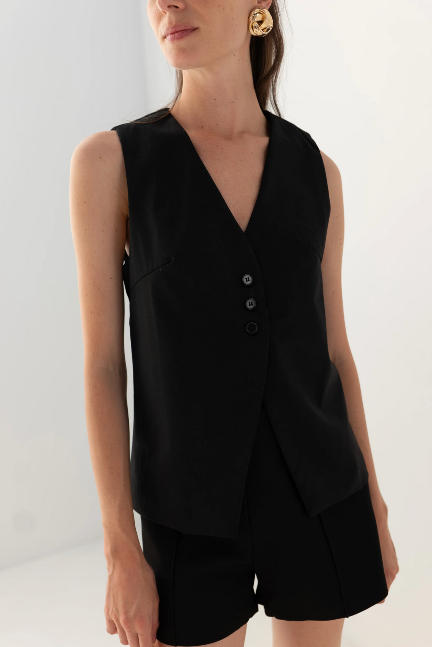 Mouwloos vest in één kleur