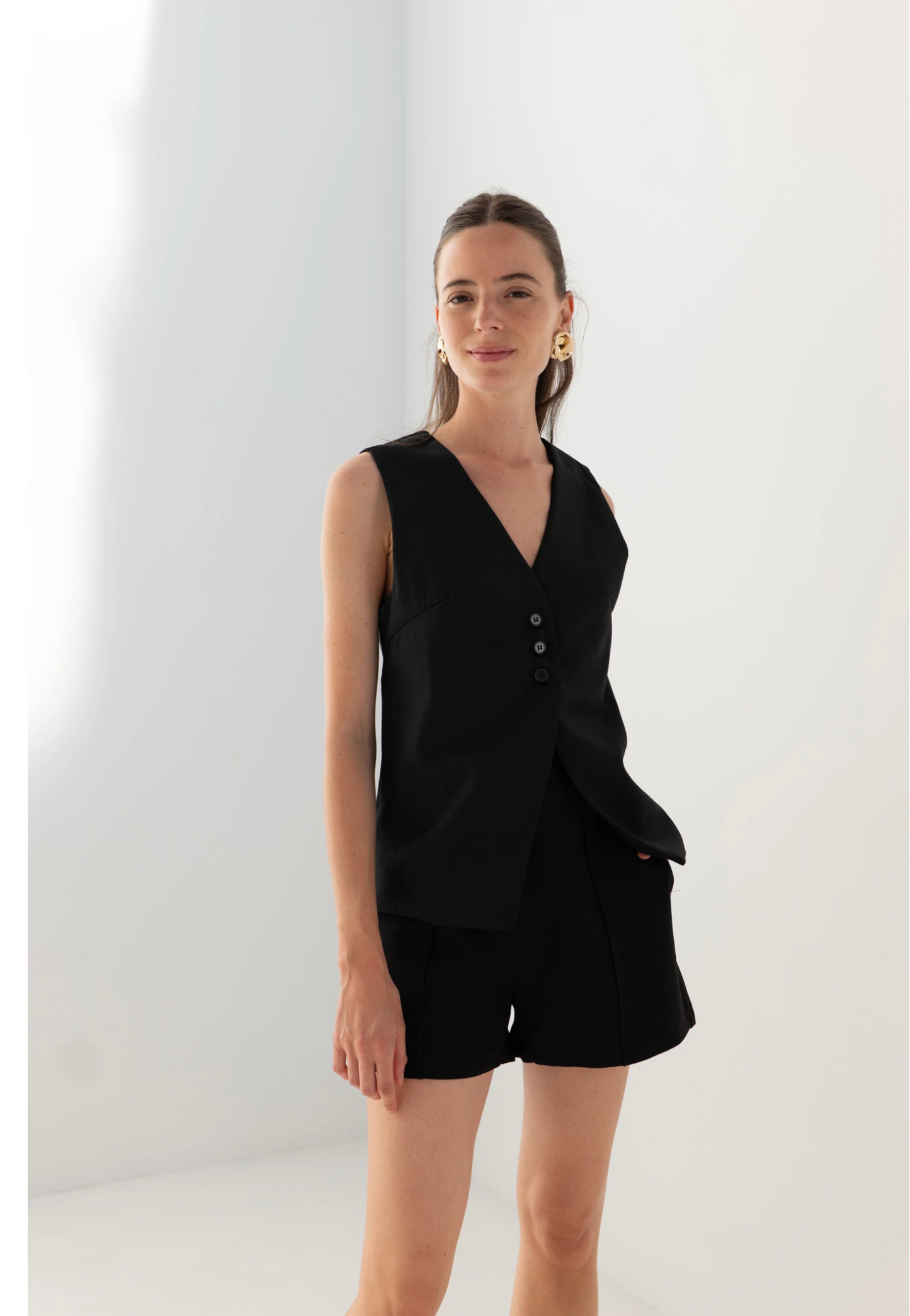 Mouwloos vest in één kleur