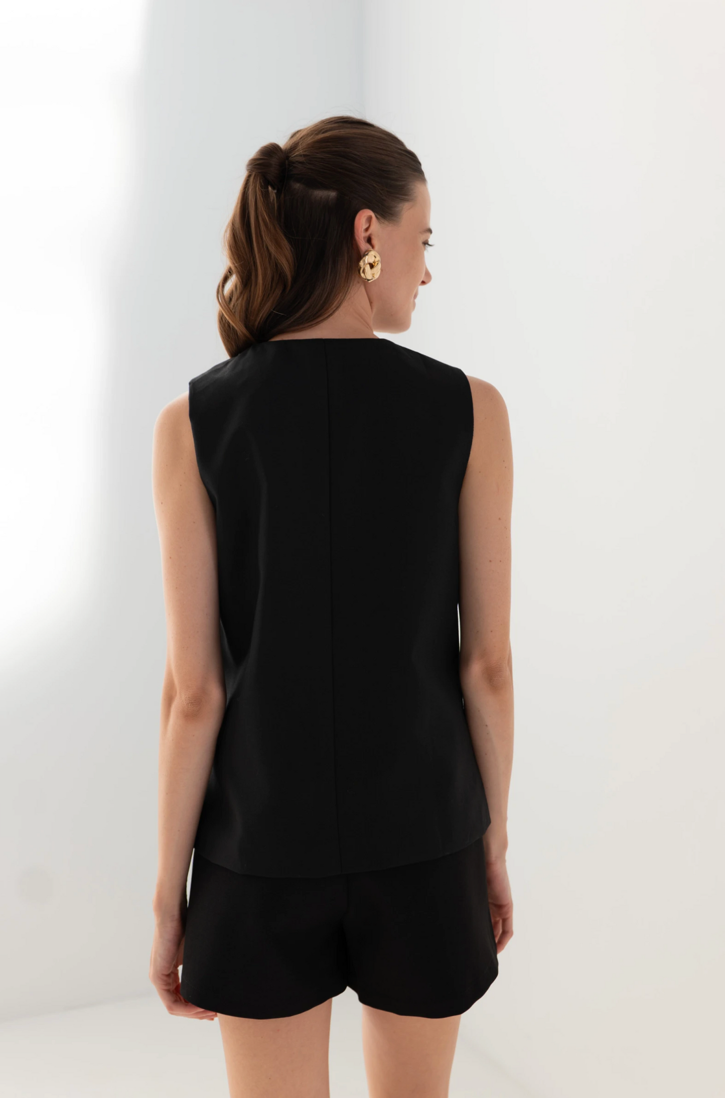 Mouwloos vest in één kleur
