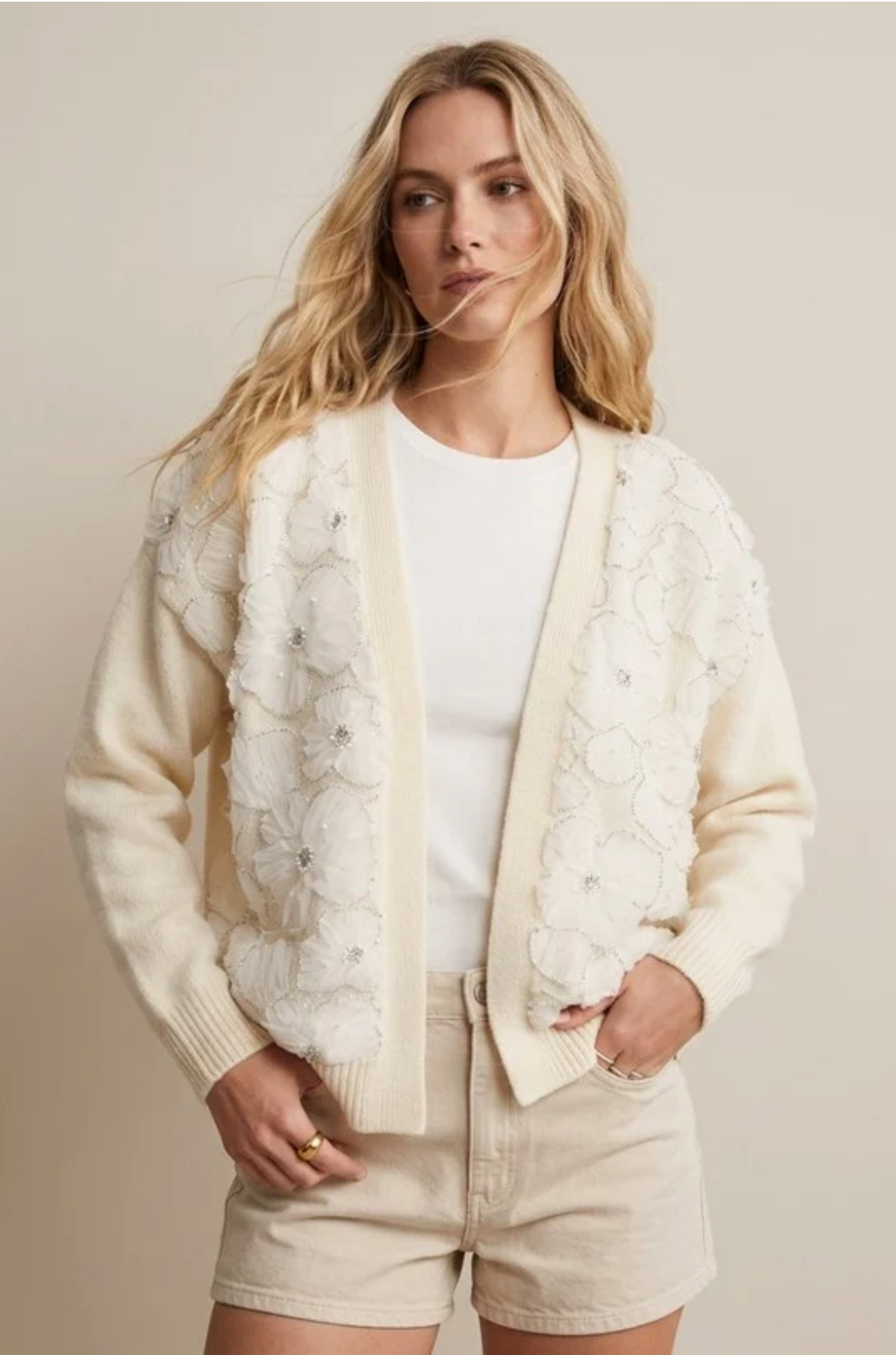Gebreid vest met parels en pailletten